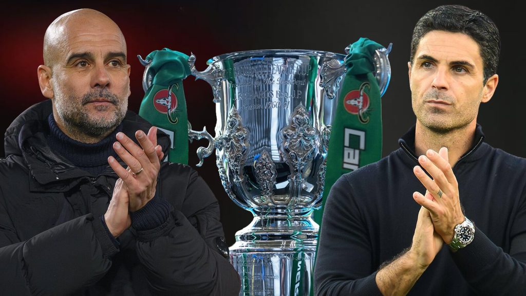 The-Carabao-Cup-trophy-with-Manchester-City-manager-Pep-Guardiola-and-Arsenal-coach-Mikel-Arteta.jpg